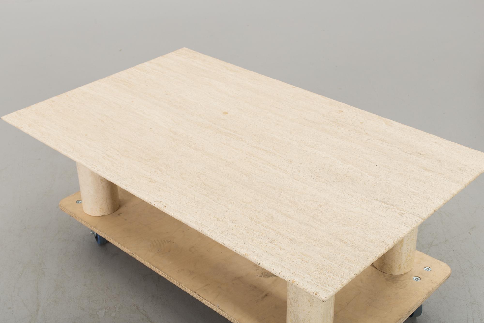A TRAVERTINE SOFA TABLE.