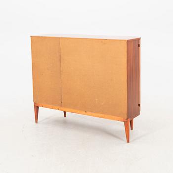 A 1940s teak and mahogany sideboard/cabinet.