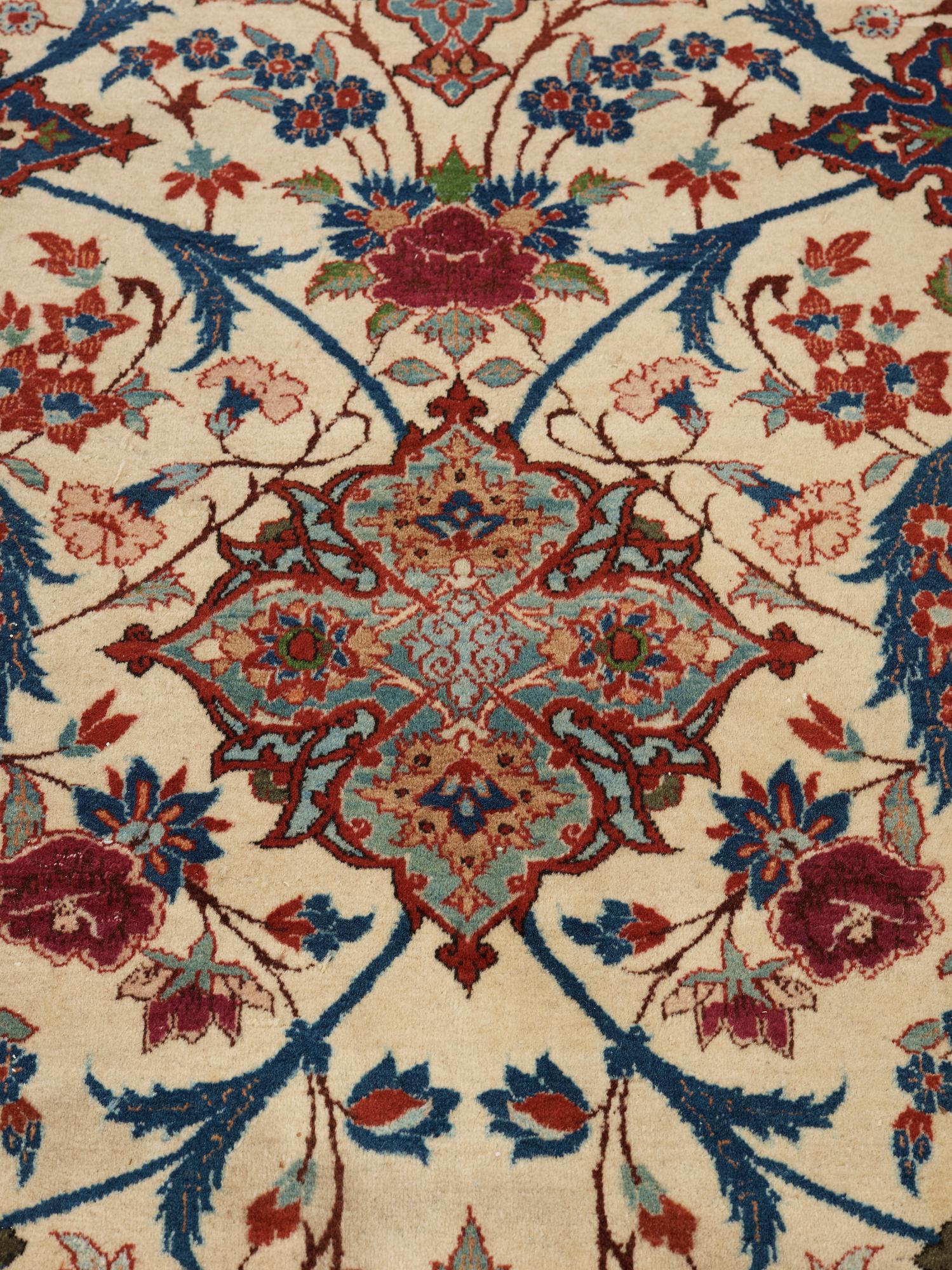 A old Esfahan carpet, around 299 x 210 cm.