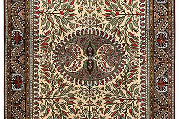 A rug, Sarouk, c. 220 x 144 cm.