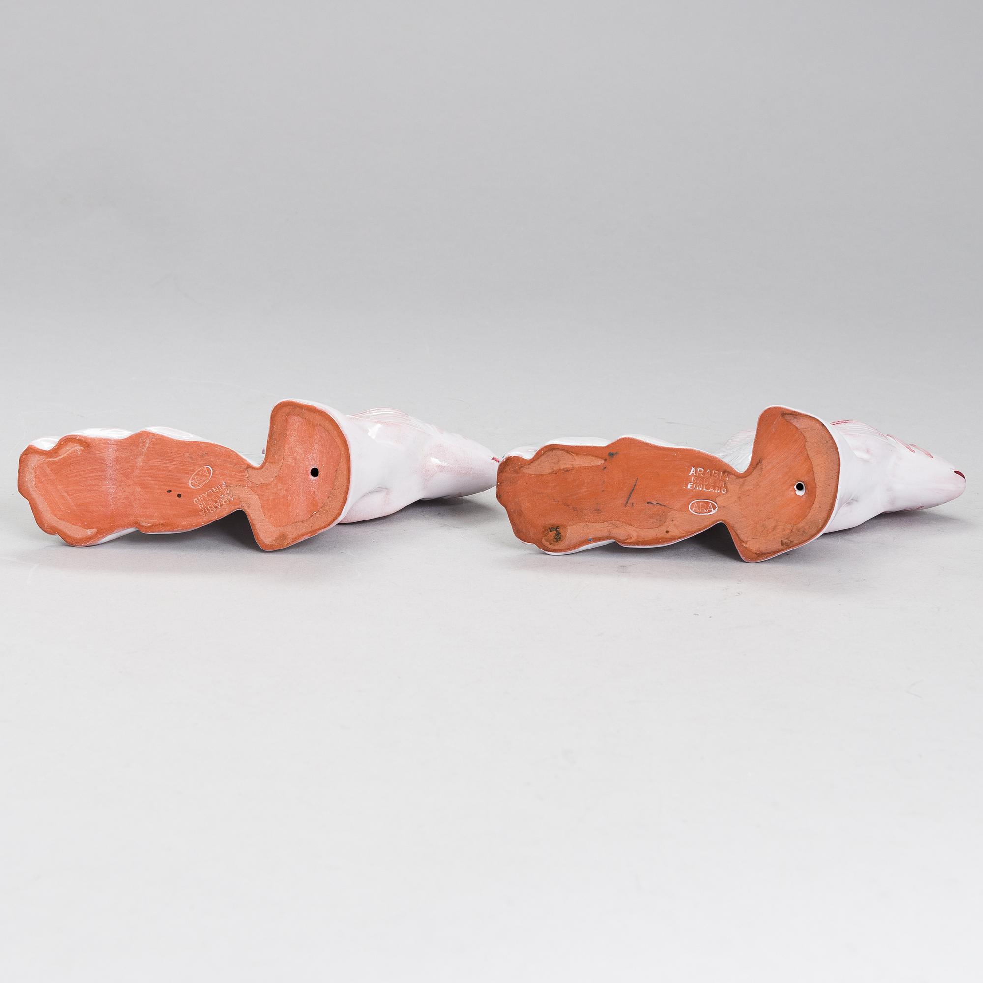 A pair of figurines by Michael Schilkin for Arabia.