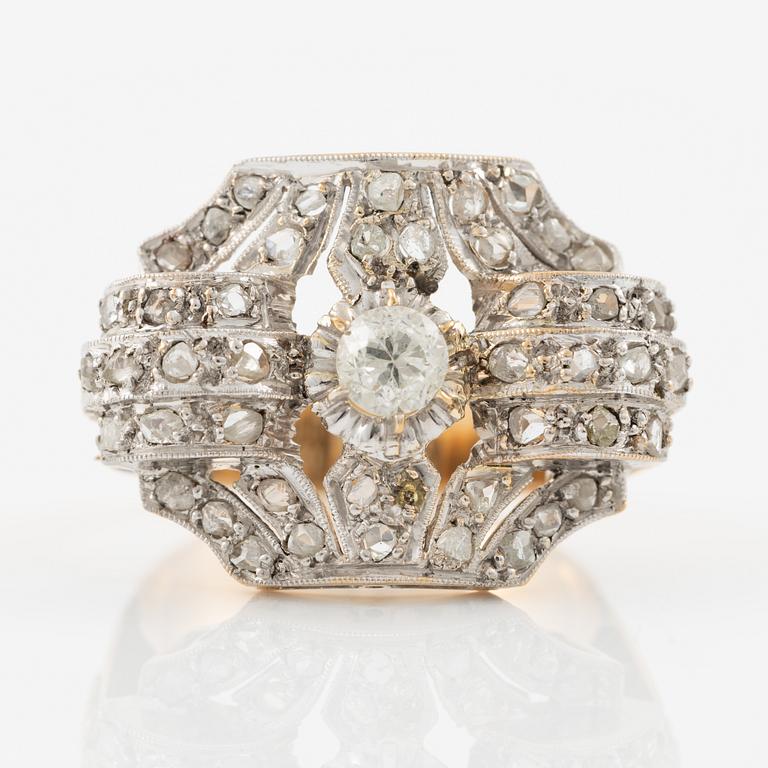 Ring in 18K gold and platinum set with an old-cut diamond and rose-cut diamonds.