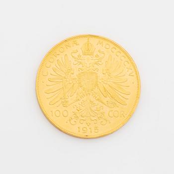 A Austrian gold coin, re-striked 100 Corona, 1915.