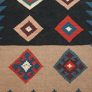 A RUG, possibly a Veramin kilim, ca 173,5 x 102,5 cm.