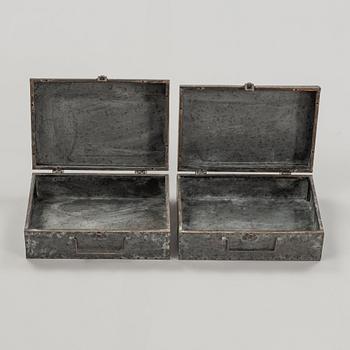 A set of 14 pcs metal boxes.