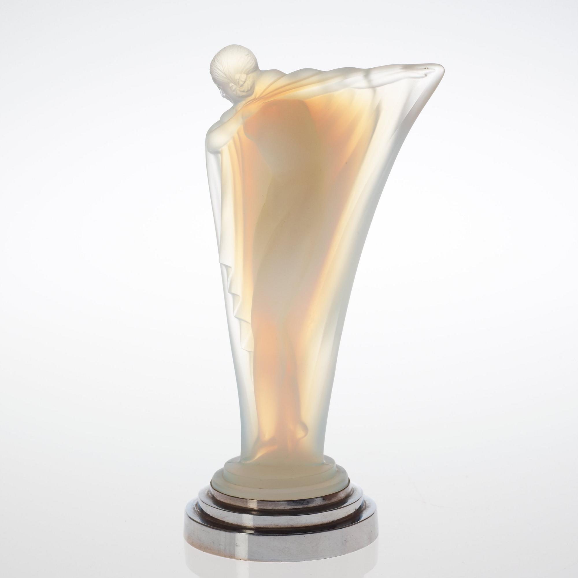 An Etling Art Deco opalescent mould-glass figure, Paris circa 1925.