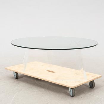 A late 20th century glass and plexi coffee table.