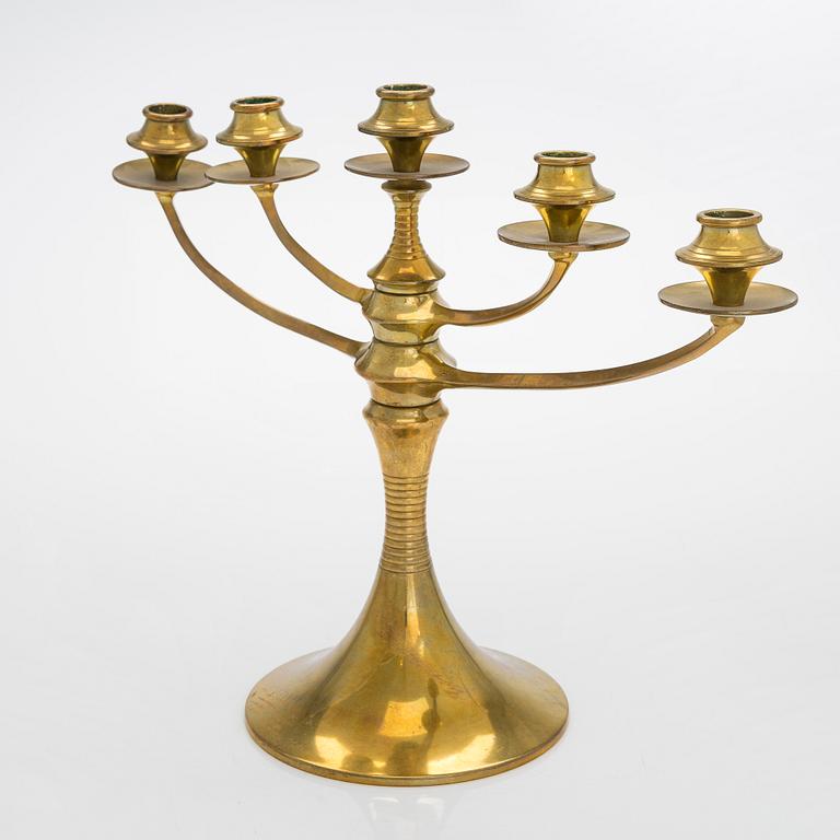 A Jugend brass candlelabra, early 20th century,