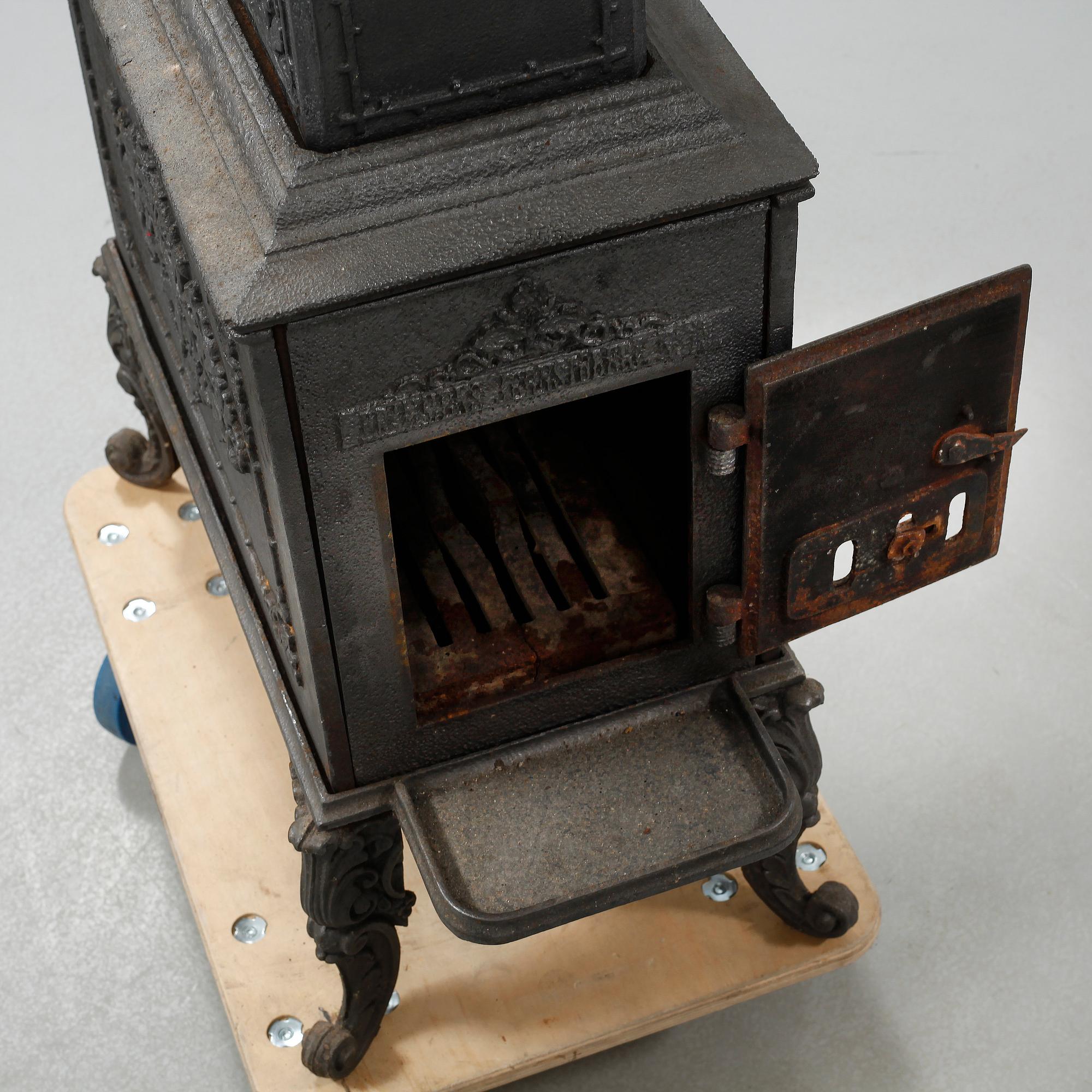 Kamin, gjutjärn, 1900-talets första hälft.