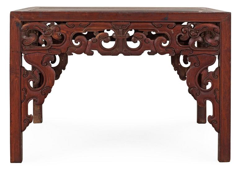 A hardwood free standing table, Qing dynasty, presumably 18th Century.