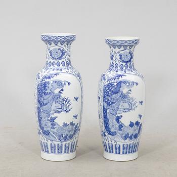 A pair of porcelain 21st century floor vases.