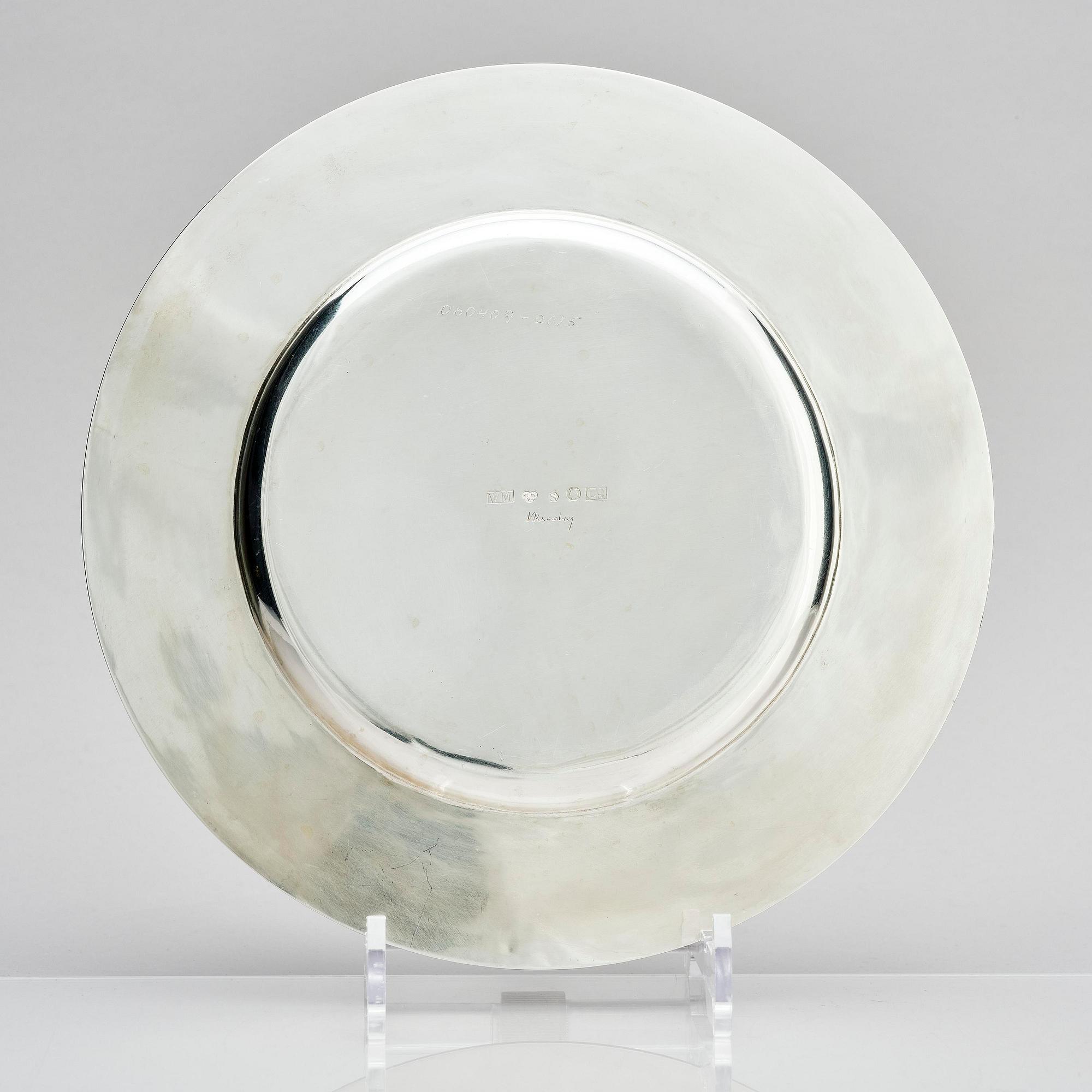 Victor Mossberg, a set of twelve silver plates, Stockholm, 1953-55.