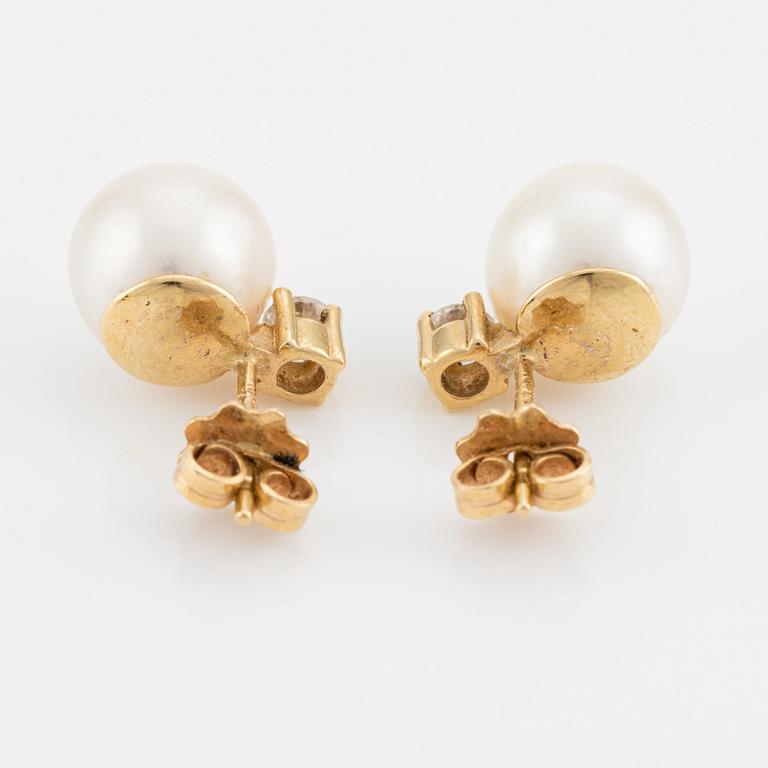 Earrings, a pair, with cultured pearls and brilliant-cut diamonds.