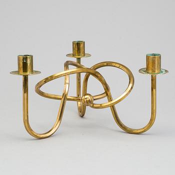 JOSEF FRANK, ljusstake, mässing ”Vänskapsknuten”, Firma Svenskt Tenn.