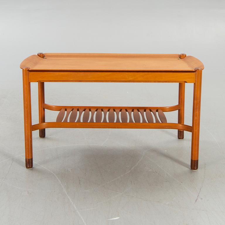 An NK  1950/60s teak coffee table.