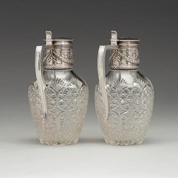 A pair of Fabergé jugs, glass and silver, Moscow 1899-1908, scratched inventori number 20116.