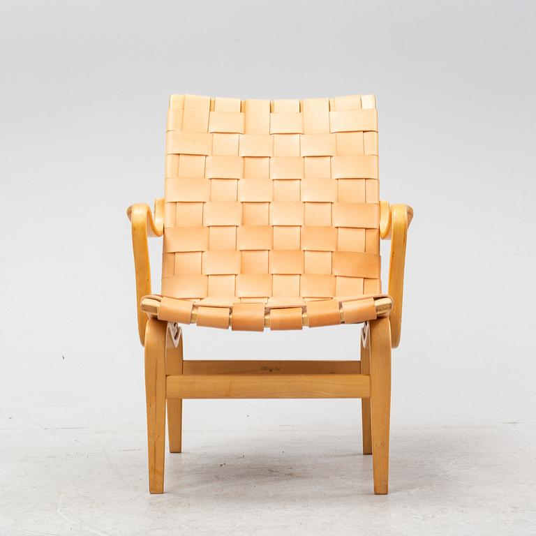 An 'Eva' easy chair by Bruno Mathsson for Firma Karl Mathsson dated 1971.