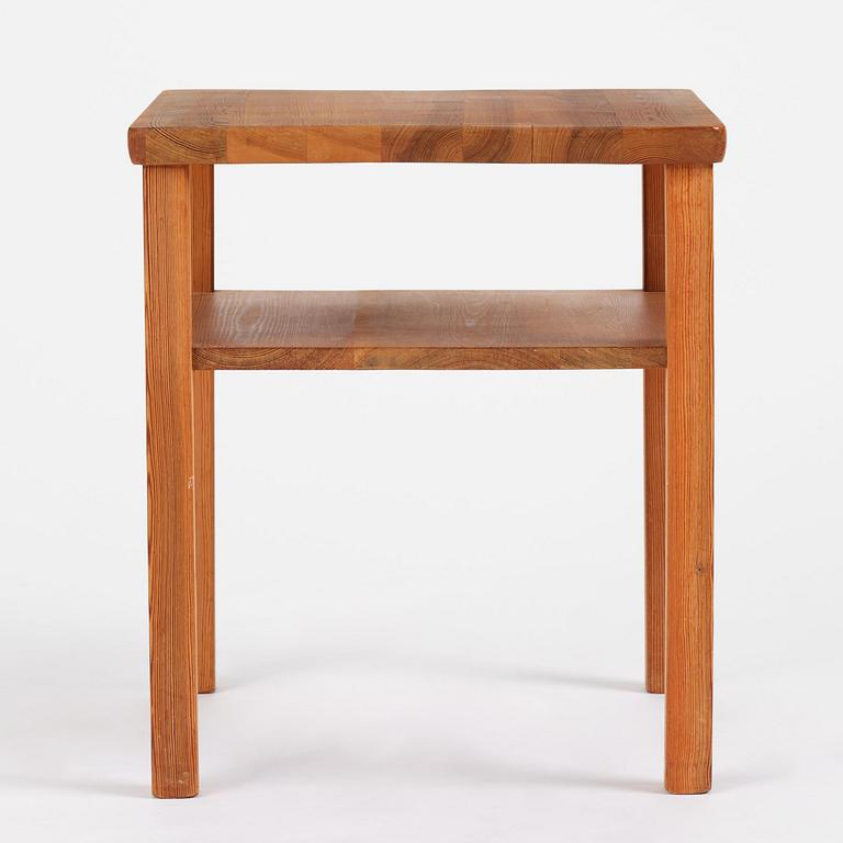Axel Einar Hjorth, a stained pine "Värmdö" table, Nordiska Kompaniet, Sweden, 1930s.
