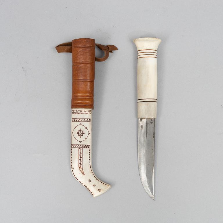 Esse Poggats, a reindeer horn knife, signed.