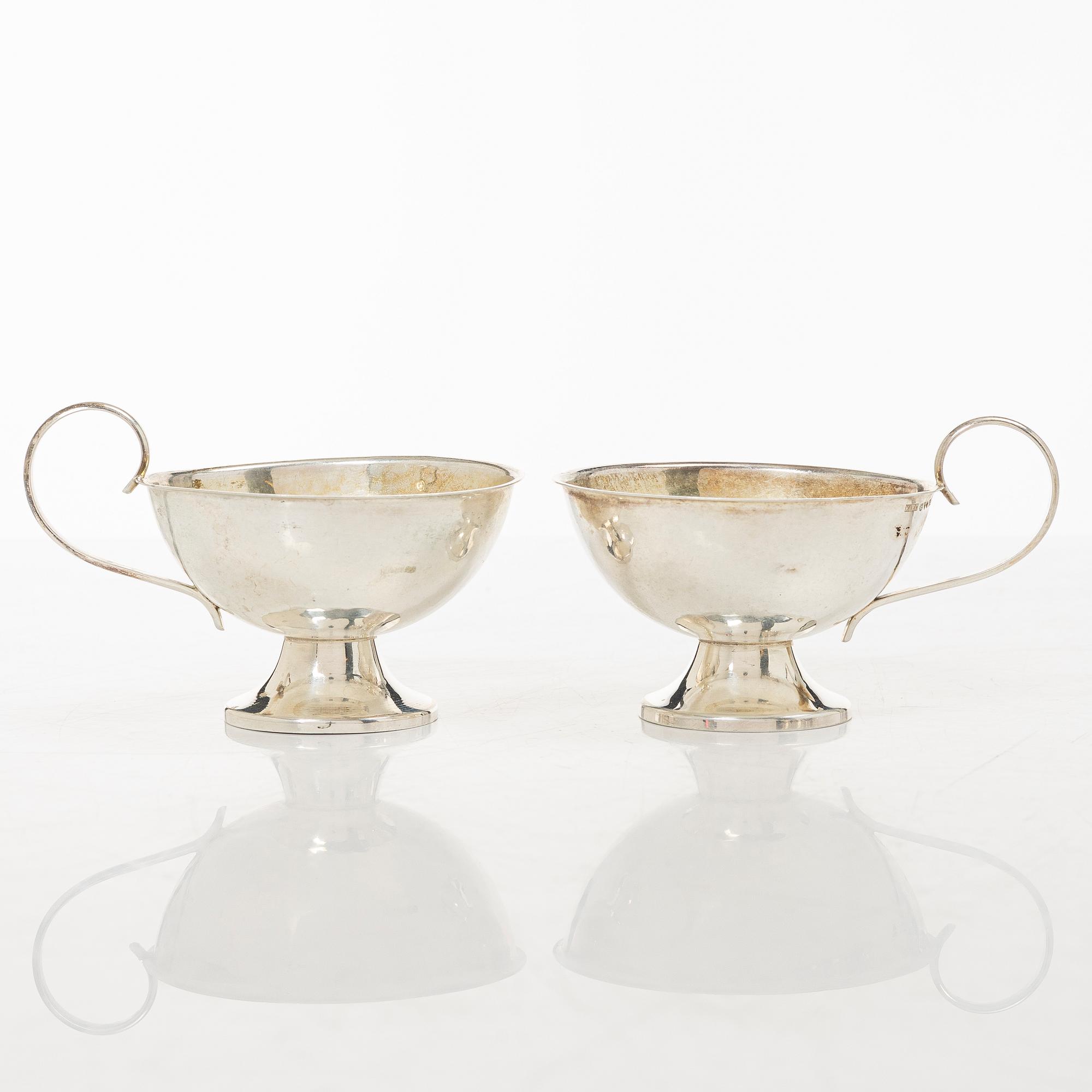 Twelve silver mugs, K&EC, Gothenburg, 1949-62.