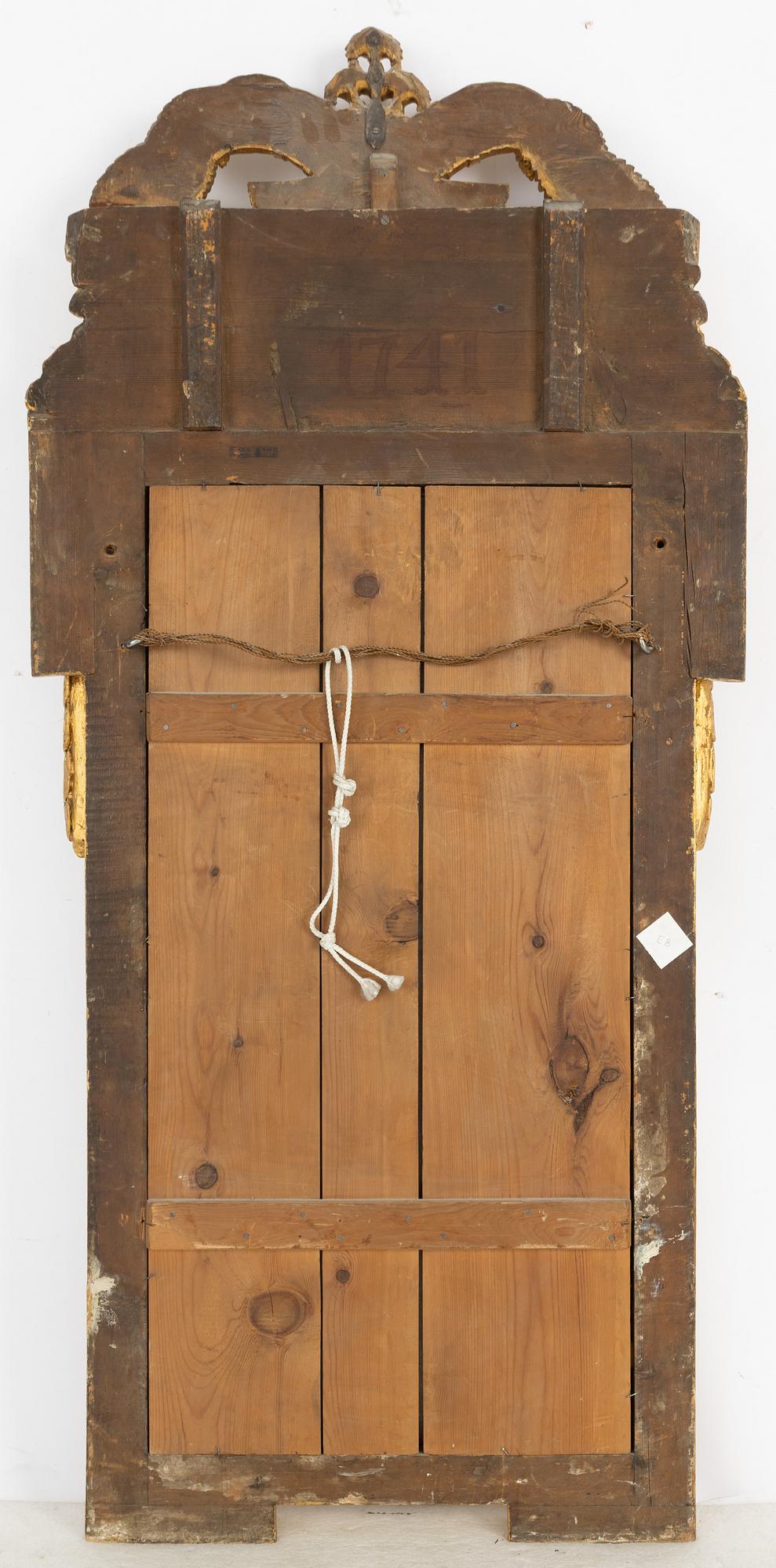 A Gustavian giltwood mirror by J. Åkerblad (master in Stockholm 1758-99).