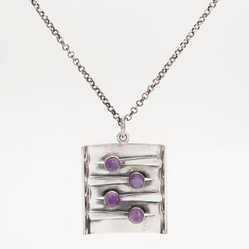 Elis Kauppi, a silver and amethyst pendant, Kupittaan Kulta, Turku 1964, with chain in sterling silver.