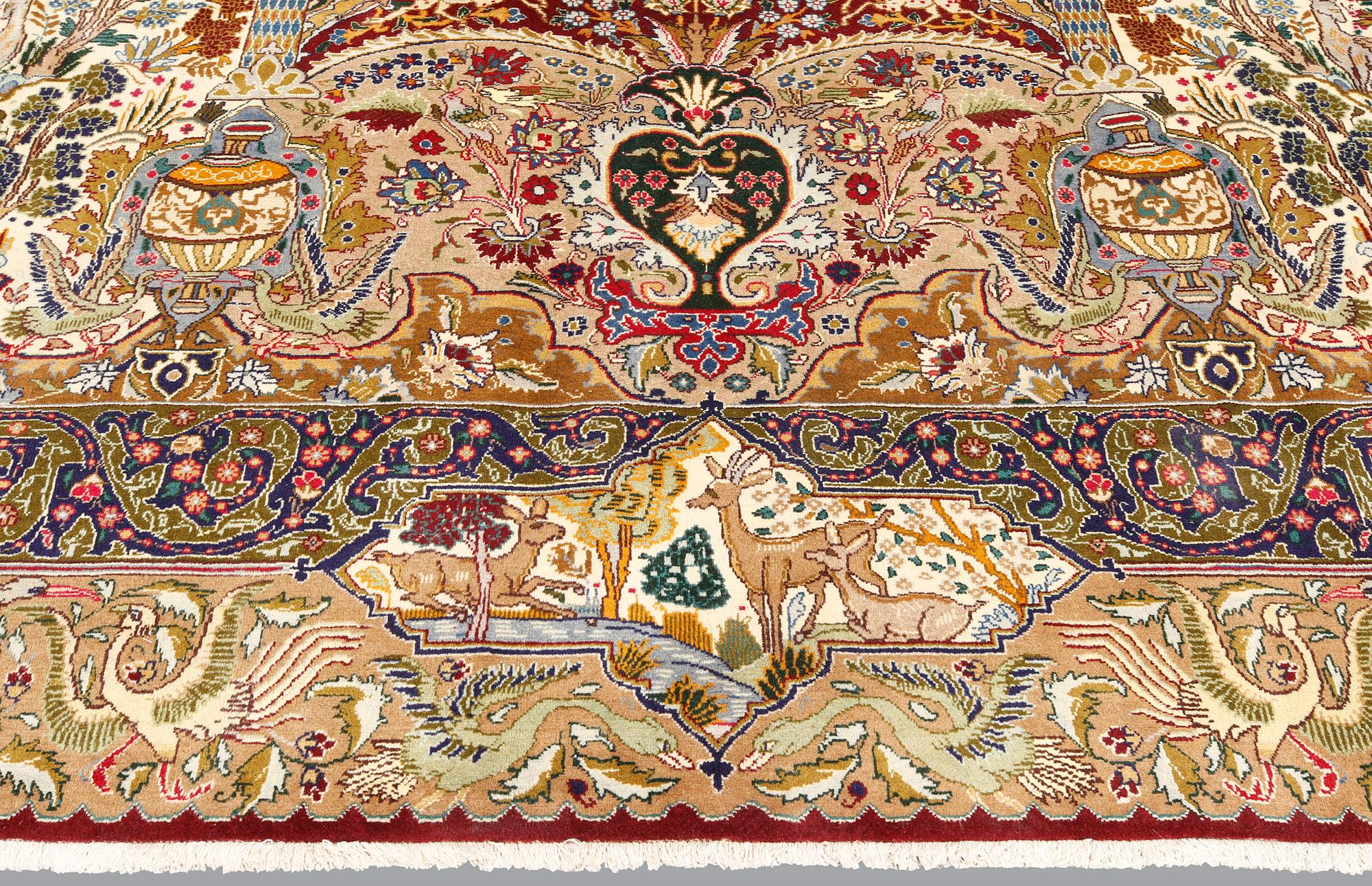 A Kashmar carpet, approx. 400 x 300 cm.