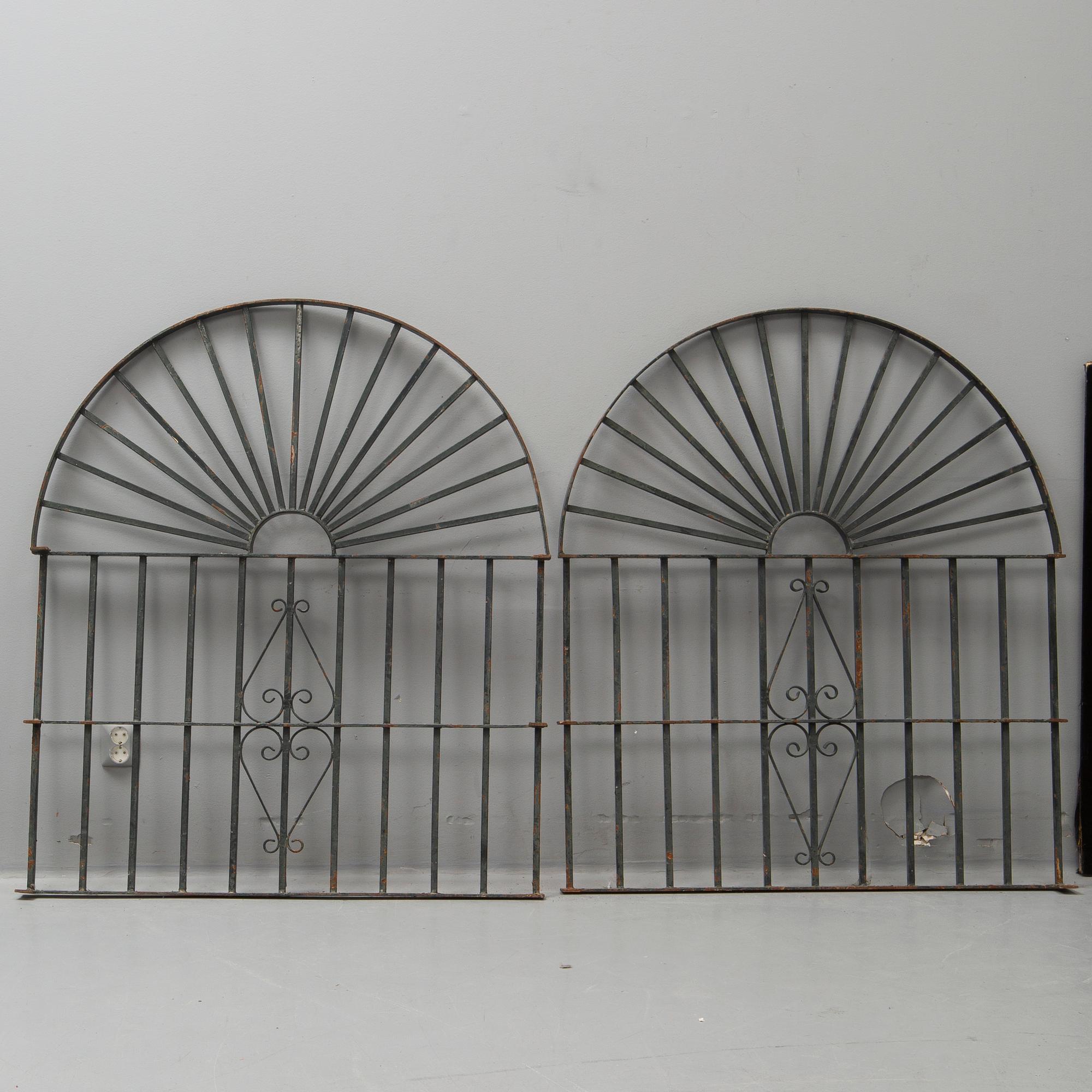 A pair of spanish iron windowgrills.