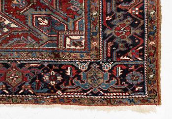A semi-antique Heris carpet, west persia c. 322 x 252 cm.