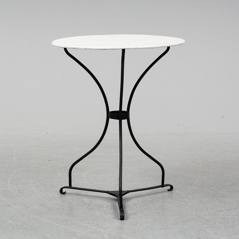 A mid 20th century garden table.