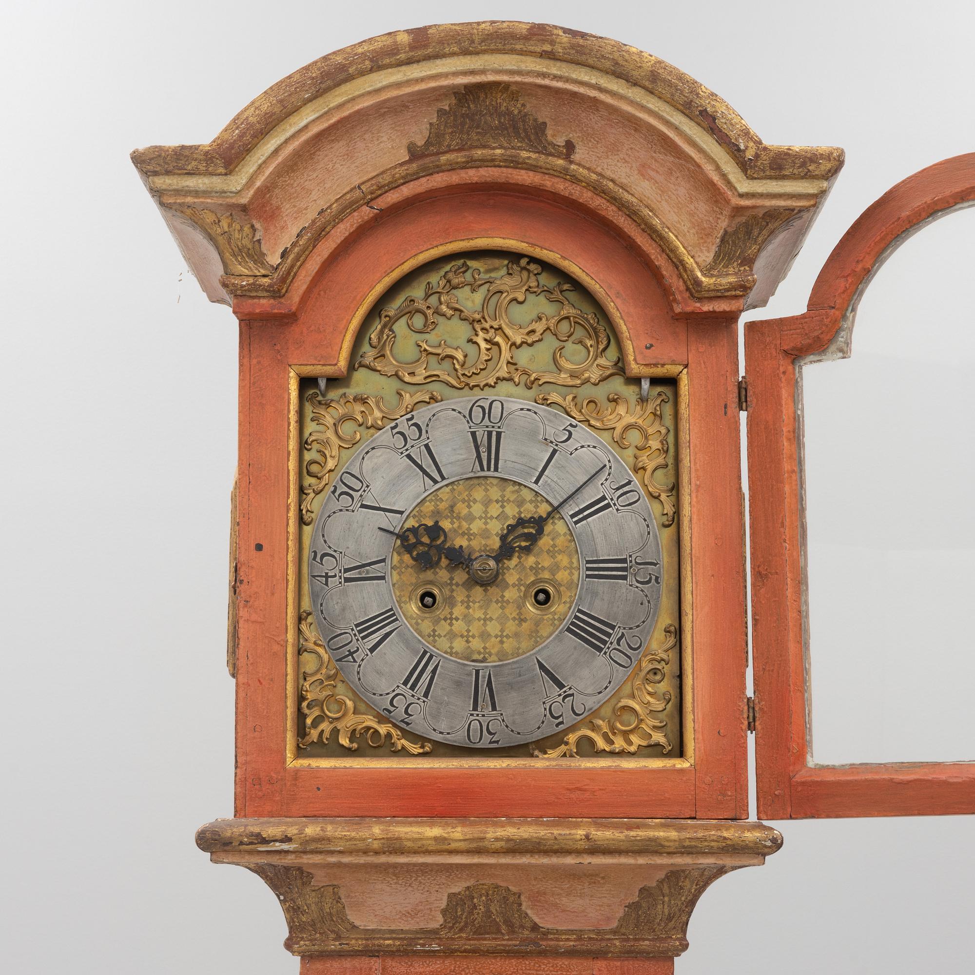A 18th century longcase clock.
