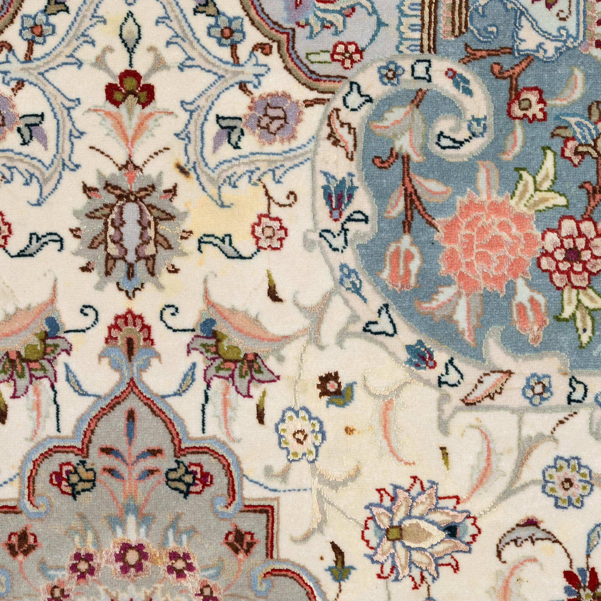 A Tabriz, carpet, 310 x 195 cm. signed.