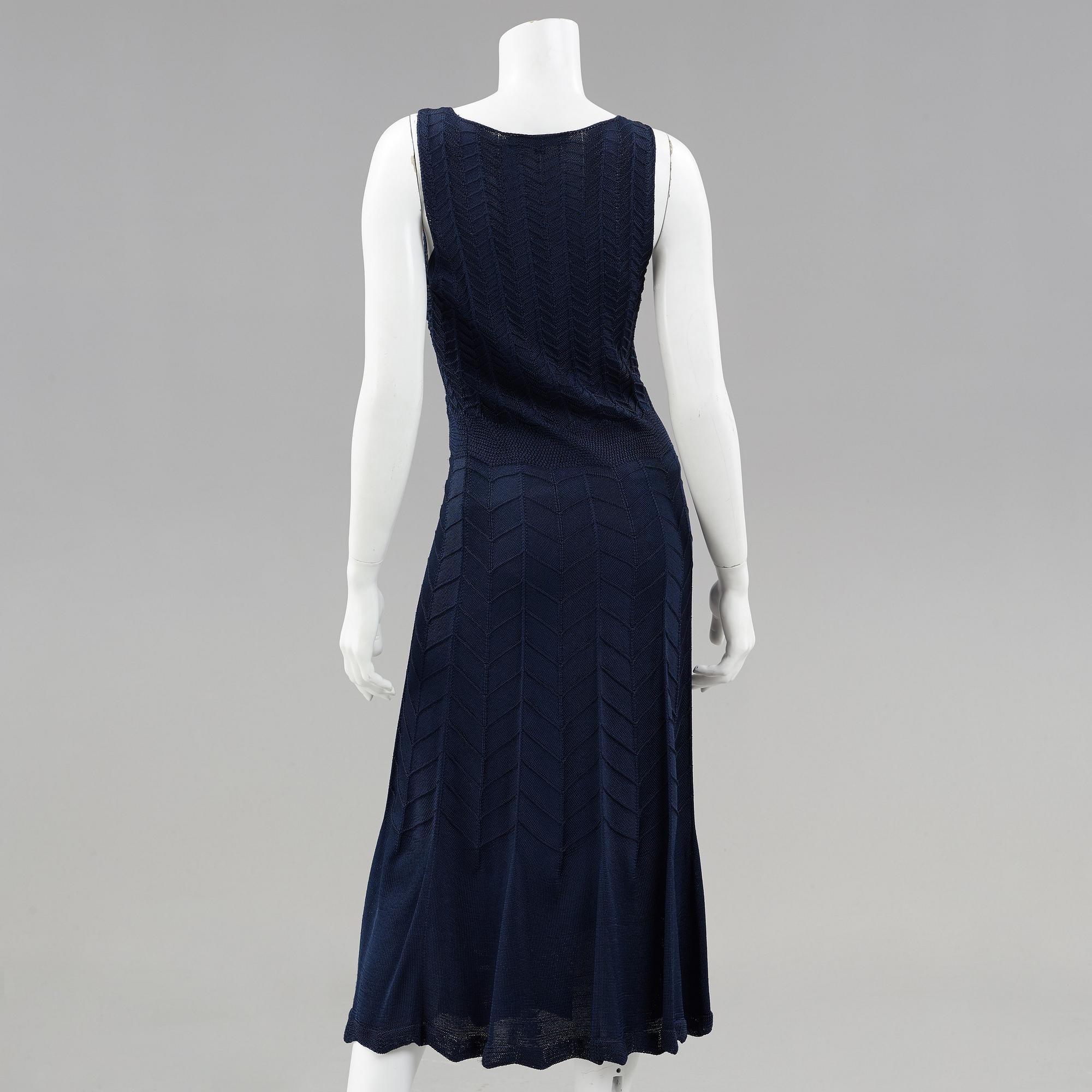 A knitten dress with long cardigan by Ralph Lauren.
