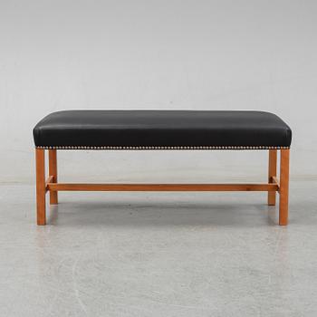 Josef Frank, a model 2082 bench for Firma Svenskt Tenn.