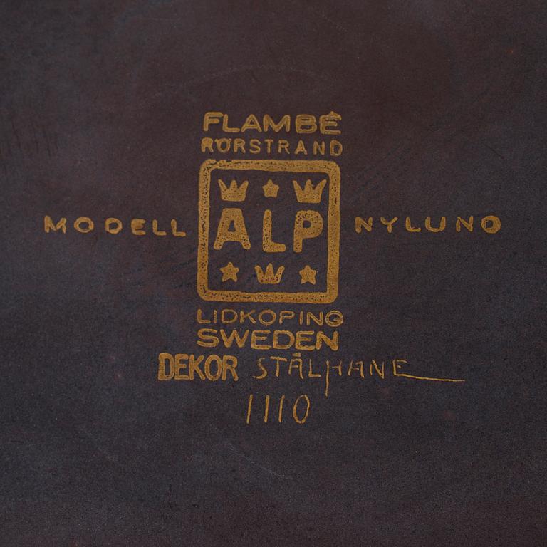 A flambé stoneware jar with cover by Gunnar Nylund for Rörstrand.