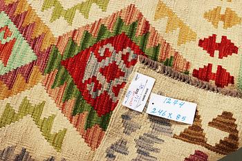 A Kilim runner, Afghanistan, c. 246 x 85 cm.