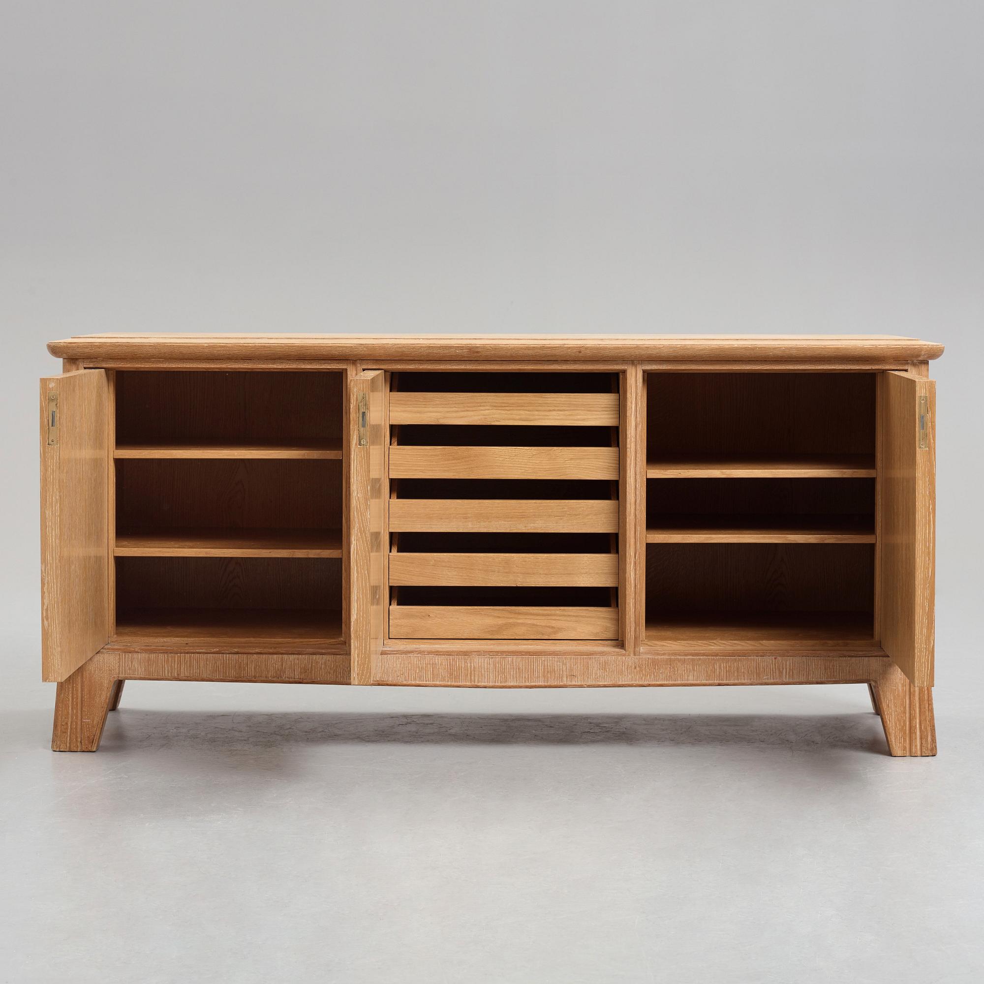 Oscar Nilsson, attributed to, an oak Swedish Modern sideboard, 1940's.