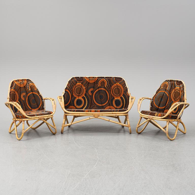 A sofa and two easy chairs, 1960s.