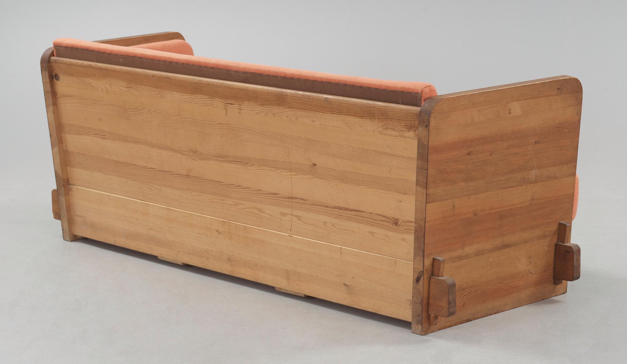 An Axel Einar Hjorth stained pine sofa 'Lovö'. Nordiska Kompaniet Sweden 1930's.