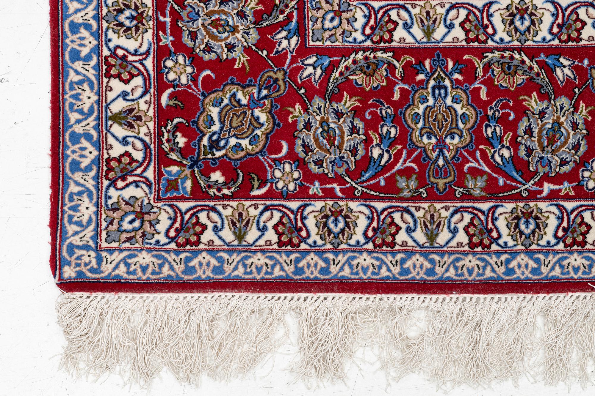 An oriental carpet, c. 310 x 200 cm.