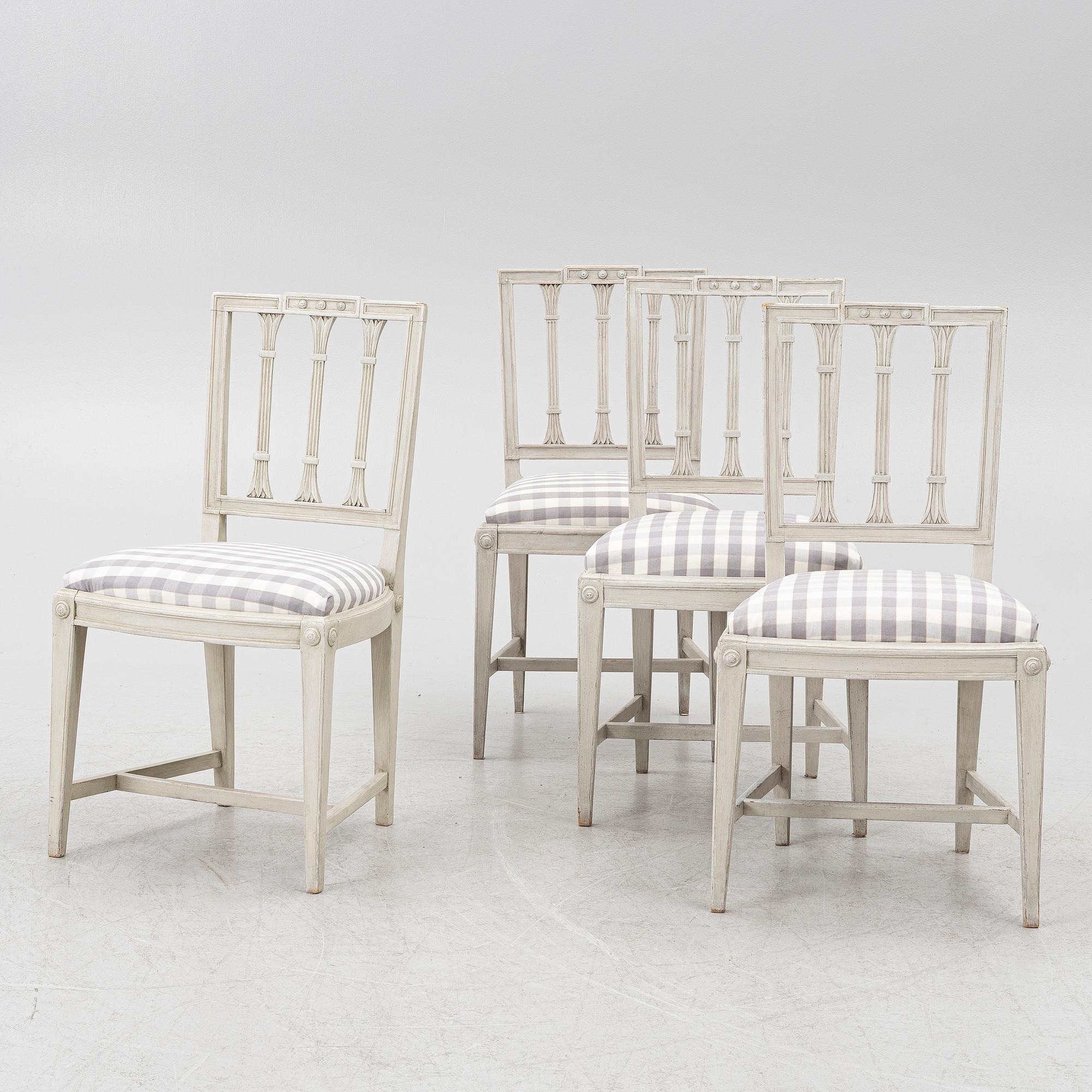 Three late Gustavian chairs, circa 1800. And one chair, late Gustavian style, 20th century.