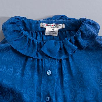 KNYTBLUS, Yves Saint Laurent.
