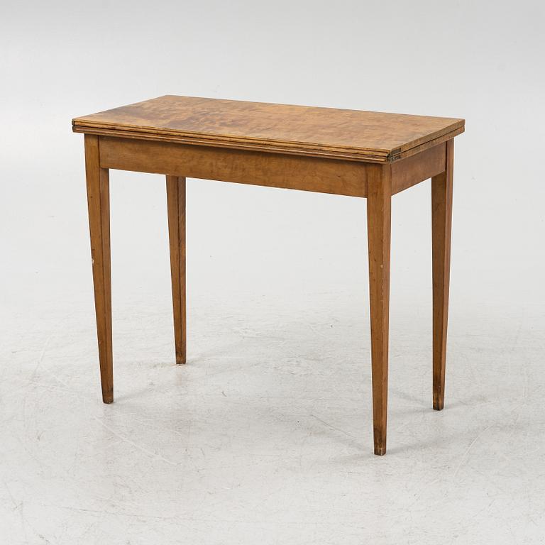 A birch card table, 20th Century.
