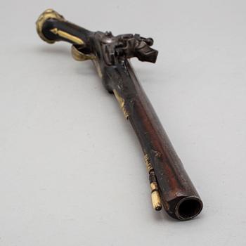 An 18th century  flintlock pistol for the oriental market.