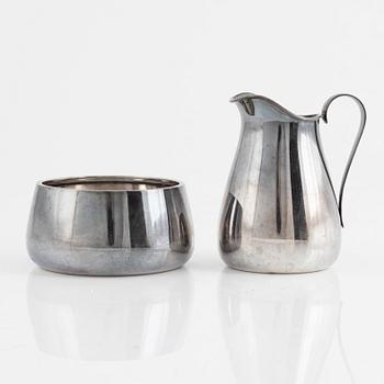 A sterling silver cream-jug and a suger bow, mark of Åke Stendahl, Stockholm 1961.