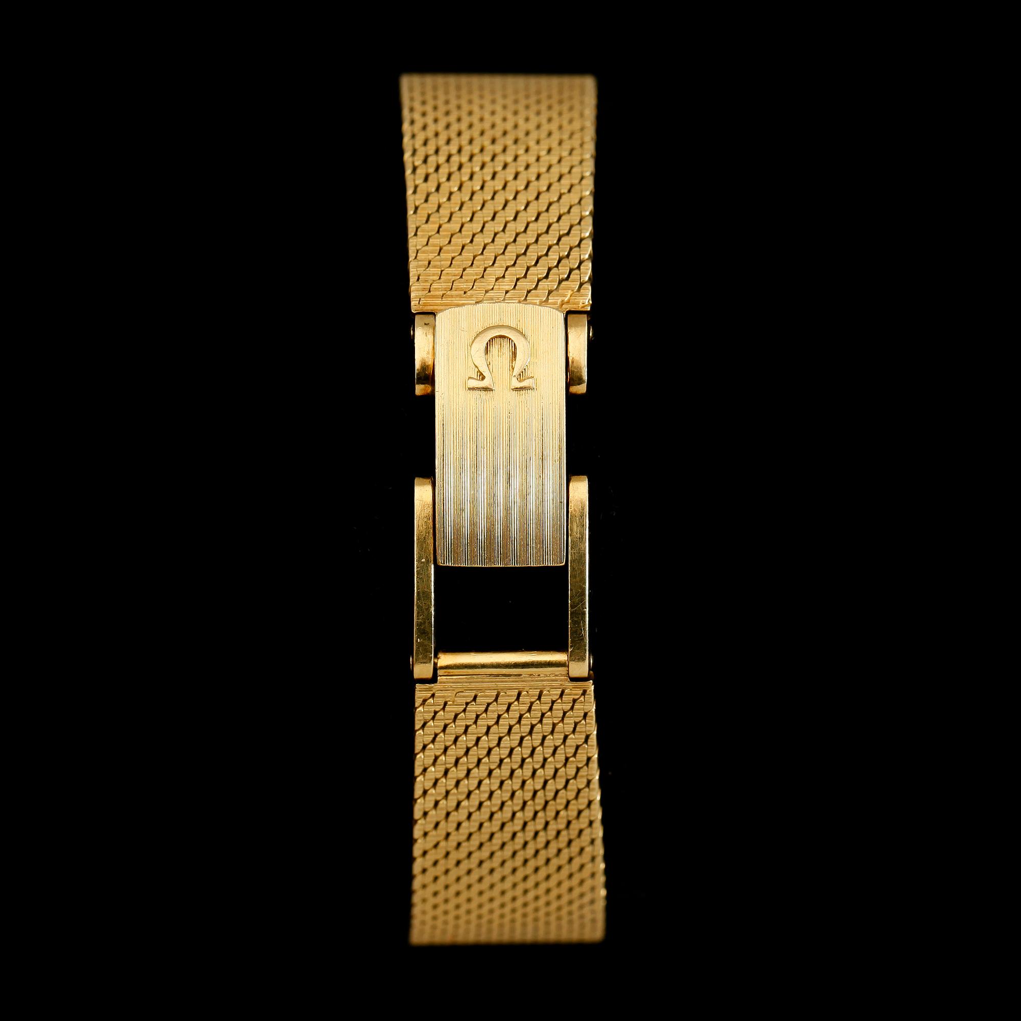 ARMBANDSUR, 18K guld, Omega. Total vikt inklusive urhus ca 43 g.