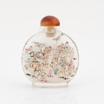 An inside painted snuff bottle with stopper, China, second part of the 20th Century. '100 boys'.