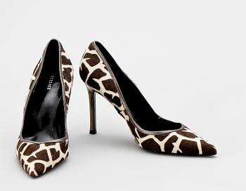 A pair of lady shoes by Versace.
