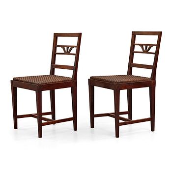 264. Carl Malmsten, a pair of Swedish Grace stained wood chairs, Stockholm 1920's.