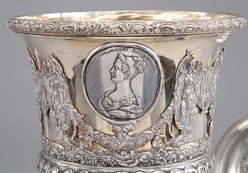 A SILVER CUP.